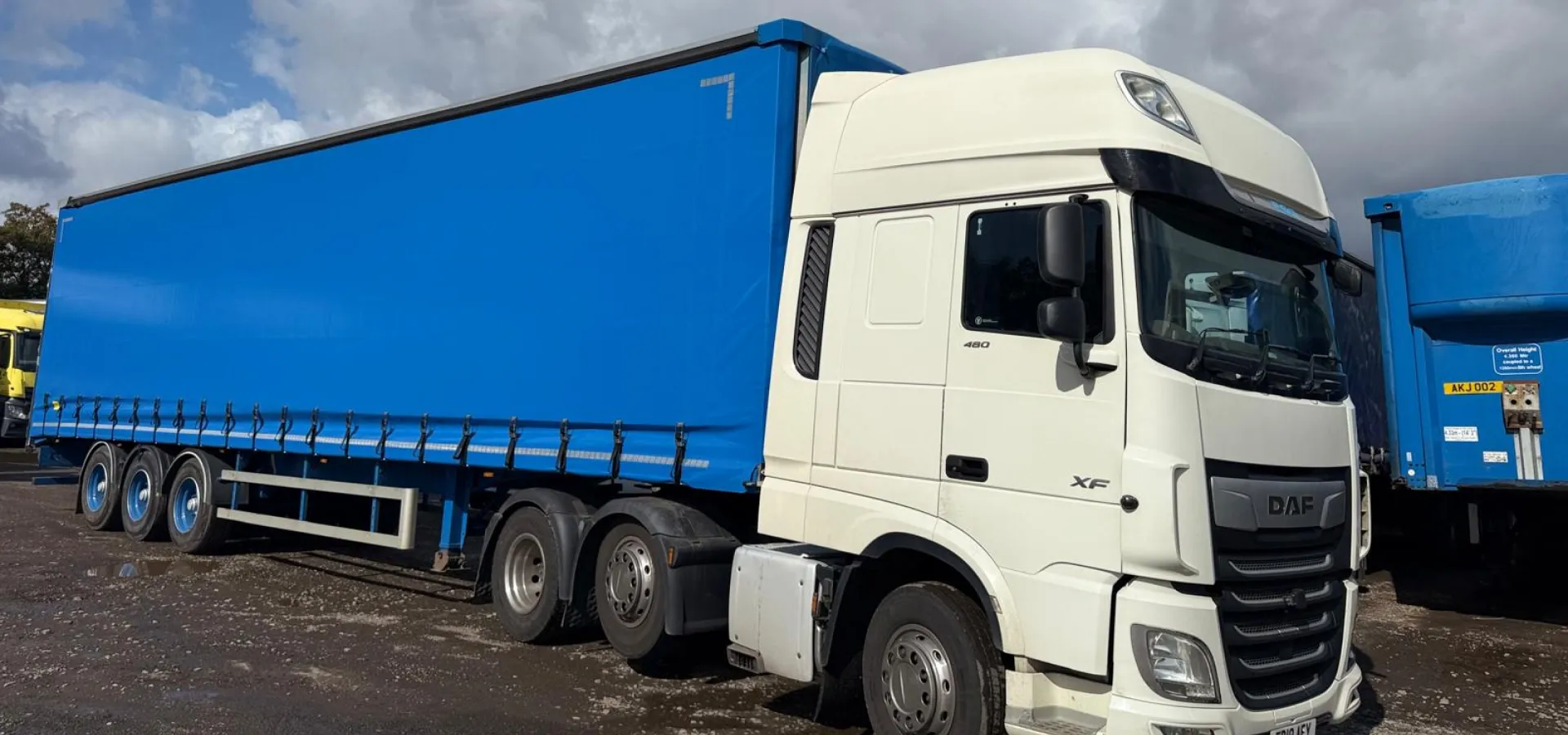 Modern haulage truck parked at logistics hub